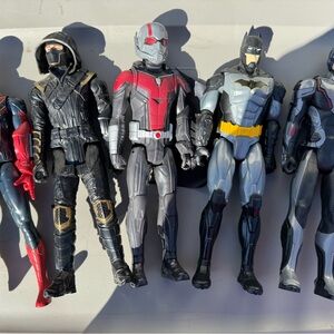 Marvel Titan Hero Series by Hasbro, along with a Batman figure.